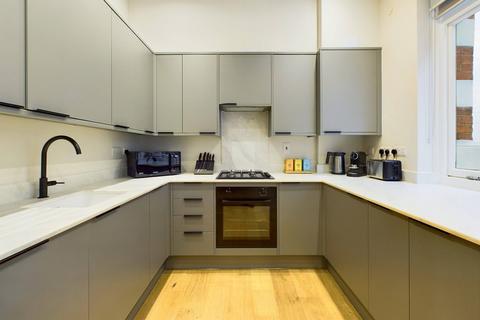1 bedroom serviced apartment to rent, Denman Street, London W1D