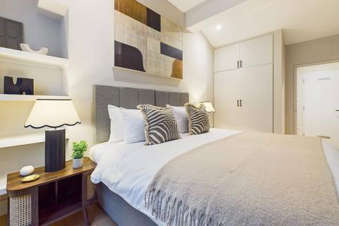 1 bedroom serviced apartment to rent, Denman Street, London W1D