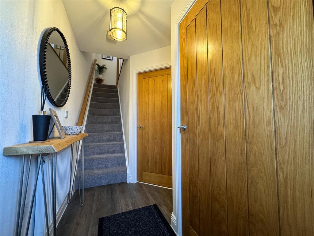 Stairs rising to first floor landing
