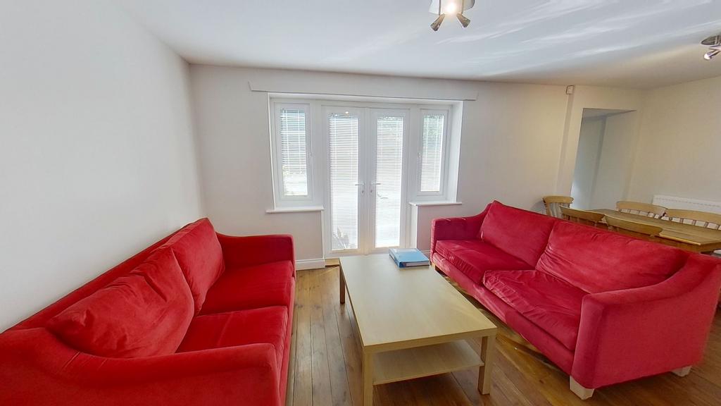 Bright and welcoming living room with matching ...