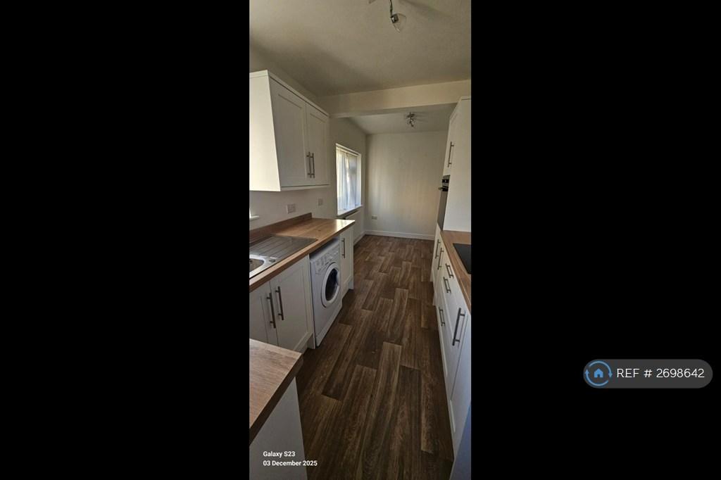 Kitchen With Dining Area