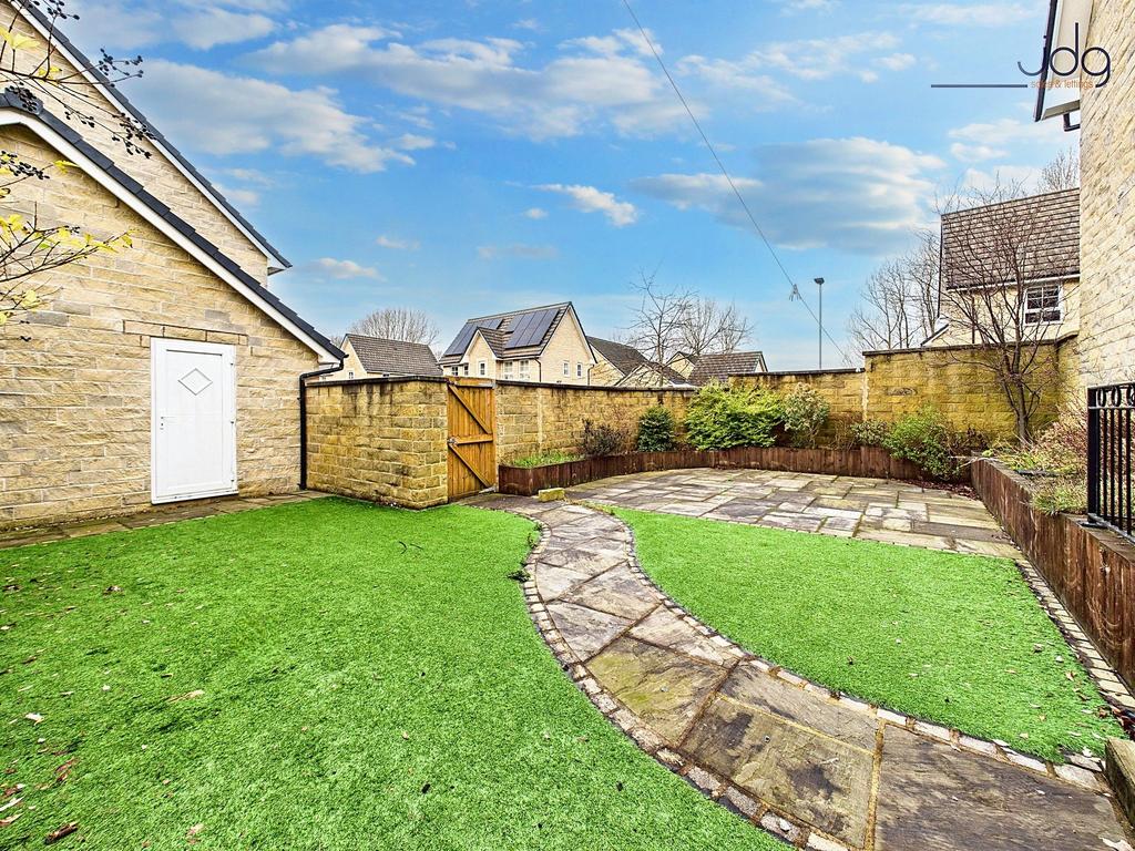 Spacious, Low-Maintenance Garden with Seating...