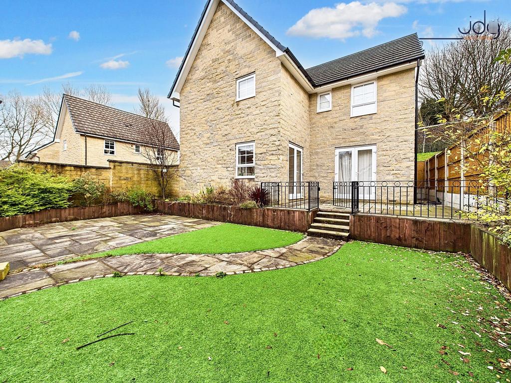 Spacious, Low-Maintenance Garden with Seating...