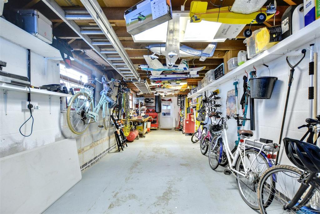 Detached pitched roof mezzanine style garage/works