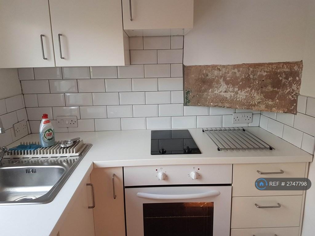 Kitchen With Electric Oven And Hob