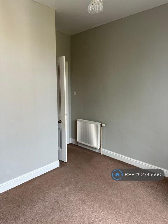 Bedroom 2 - Built In Storage Behind Bedroom Door.
