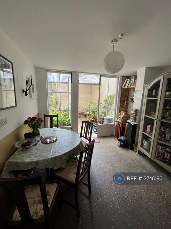 Kitchen Dining Area Opening Onto Outdoor Patio