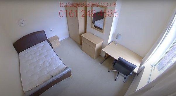 Bright, simply furnished single bedroom with a ...