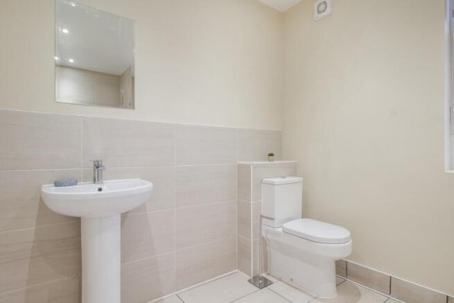 A clean and well-maintained bathroom featuring ...