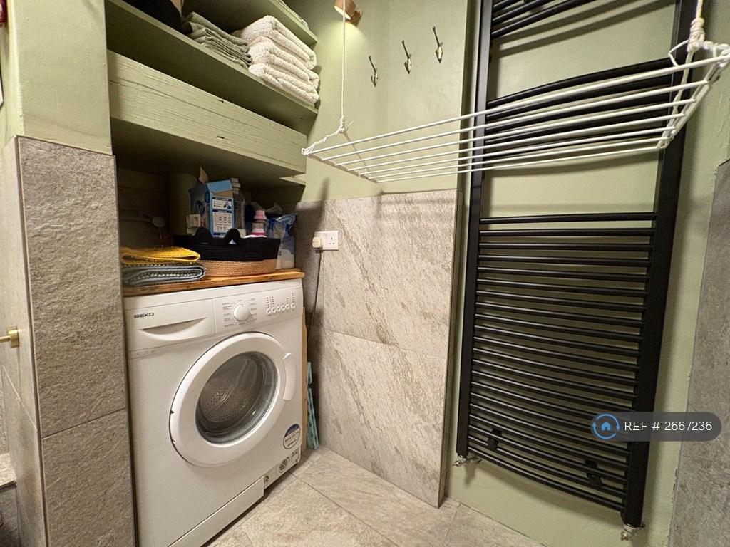 Laundry With Ceiling Rack