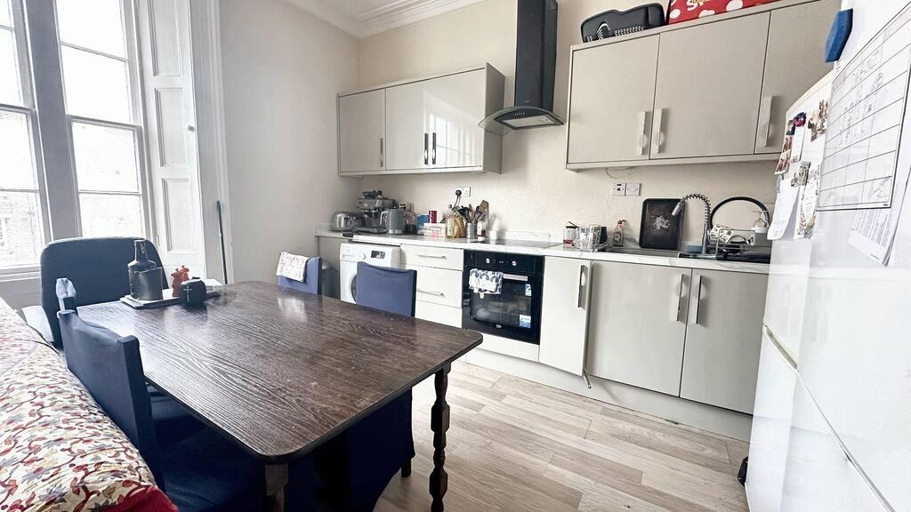Bright, modern kitchen with plenty of storage, ...