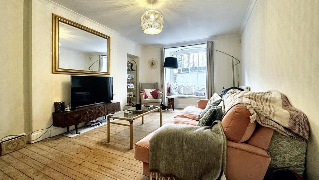 Bright, stylish living room with a comfortable ...