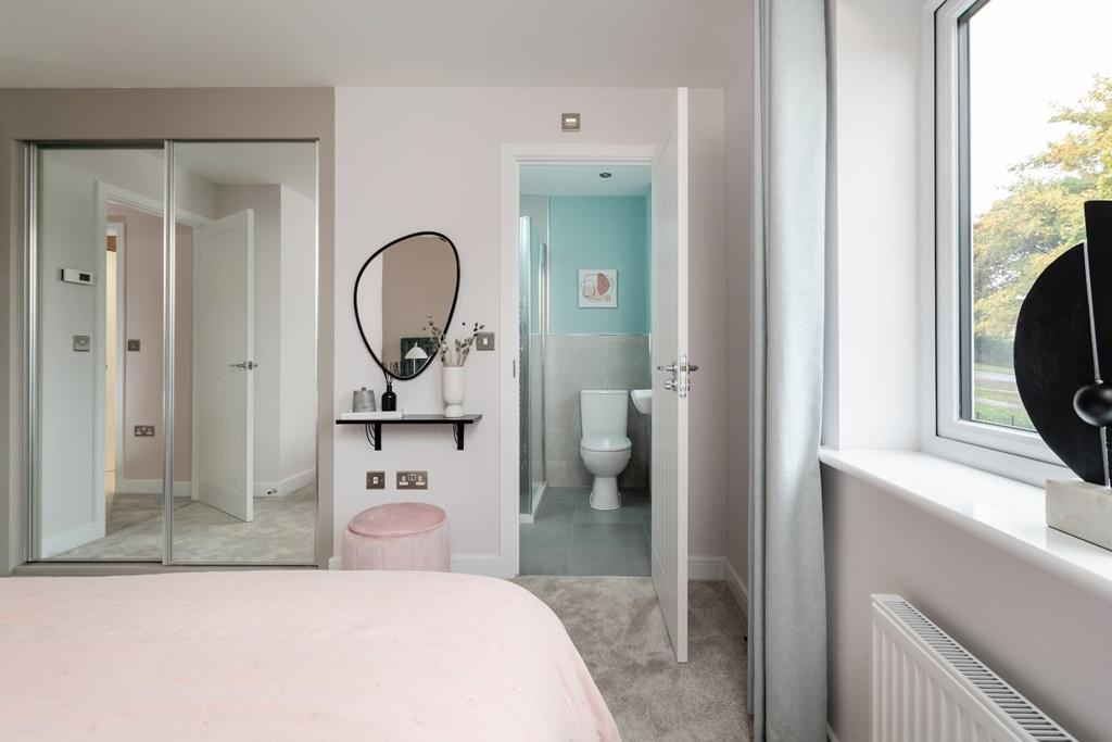 A bright en suite and plenty of wardrobe space