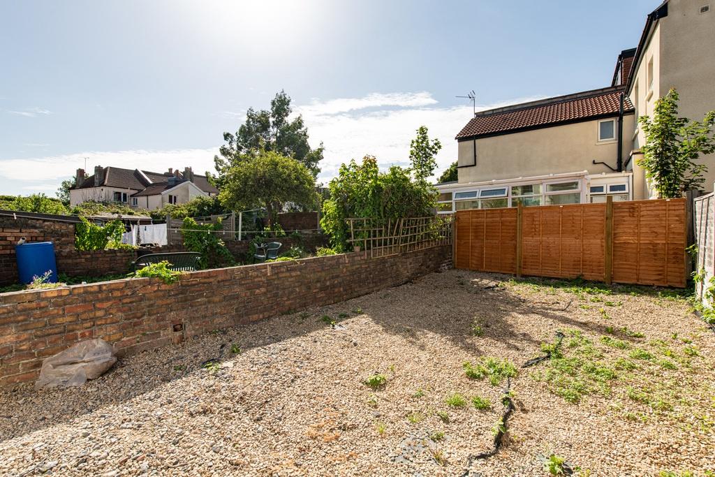 Private low-maintenance rear garden with gravel...