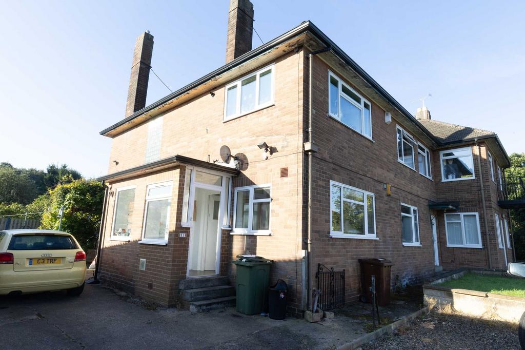 Exterior view of a traditional brick property s...