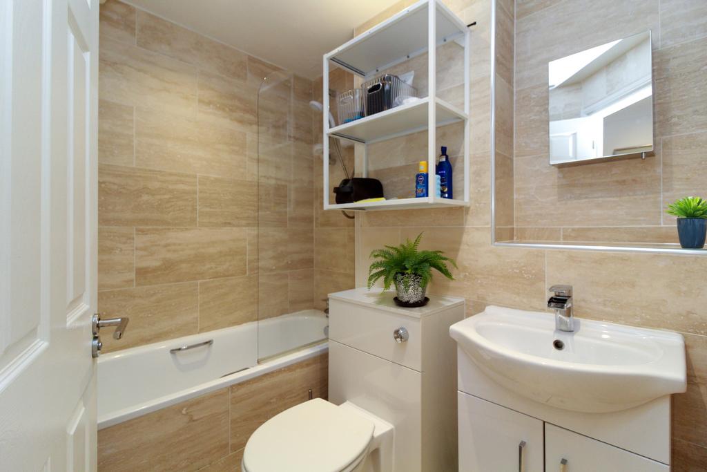 Electric shower over bath