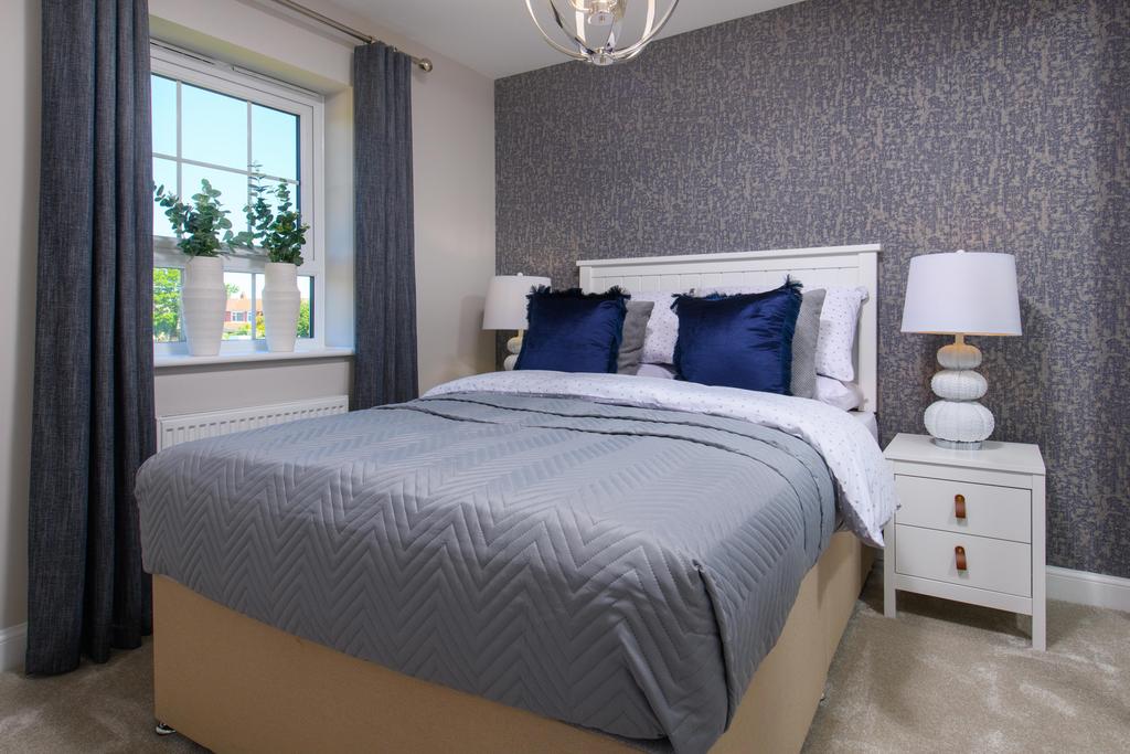 Double bedroom with built-in storage in...