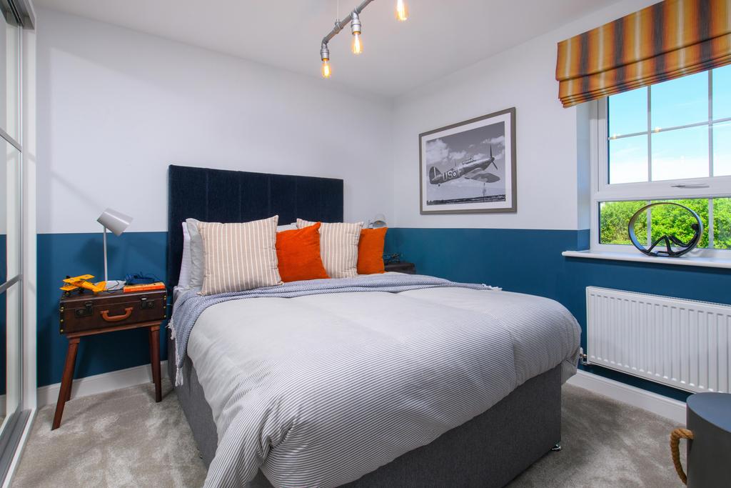 Double bedroom with built-in storage in...