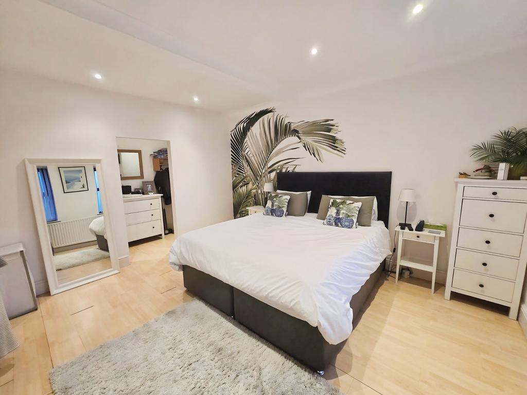 Bed 1 and wardrobe