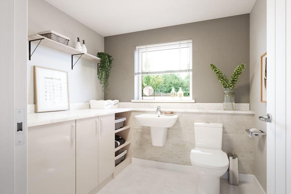A downstairs toilet and utility room adds...