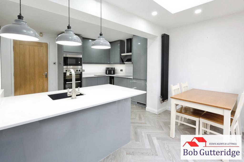 Extended modern fitted kitchen / dining room