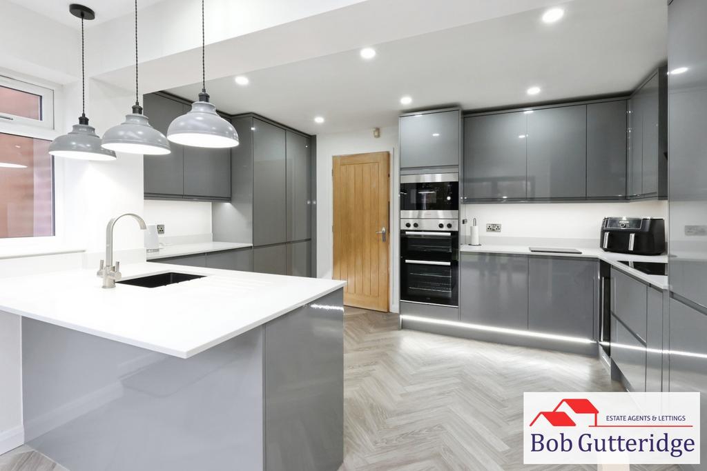 Extended modern fitted kitchen / dining room
