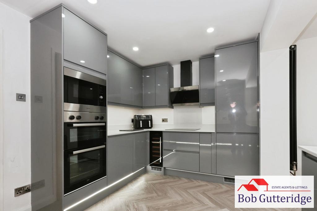 Extended modern fitted kitchen / dining room