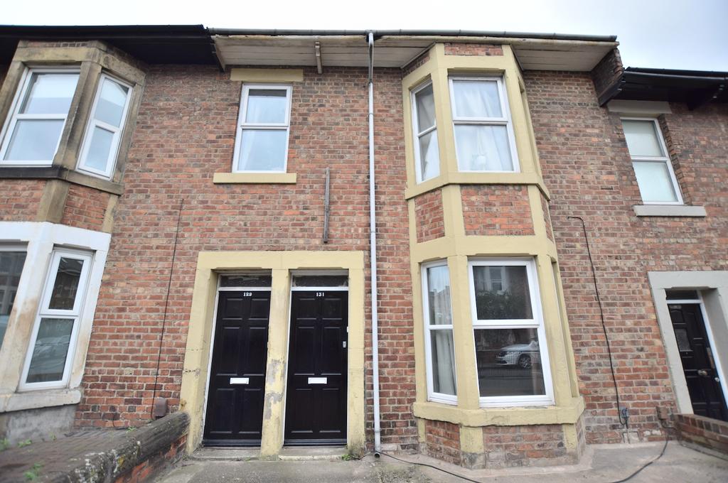 Brick-fronted terraced property with two adjace...