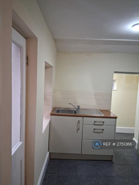 Kitchen & Rear Access To Patio