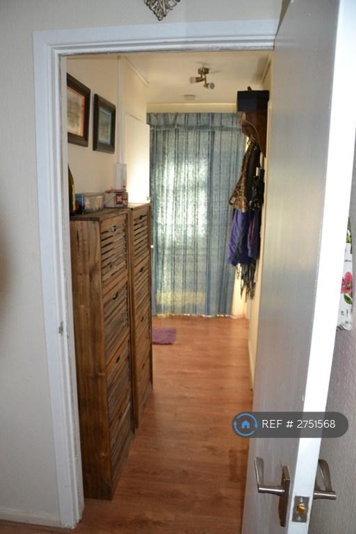 Corridor With 2 Storage Rooms And 2 Shoe Racks