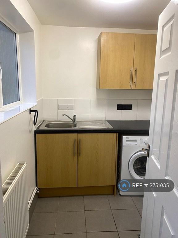 Ground Utility Room With Toilet