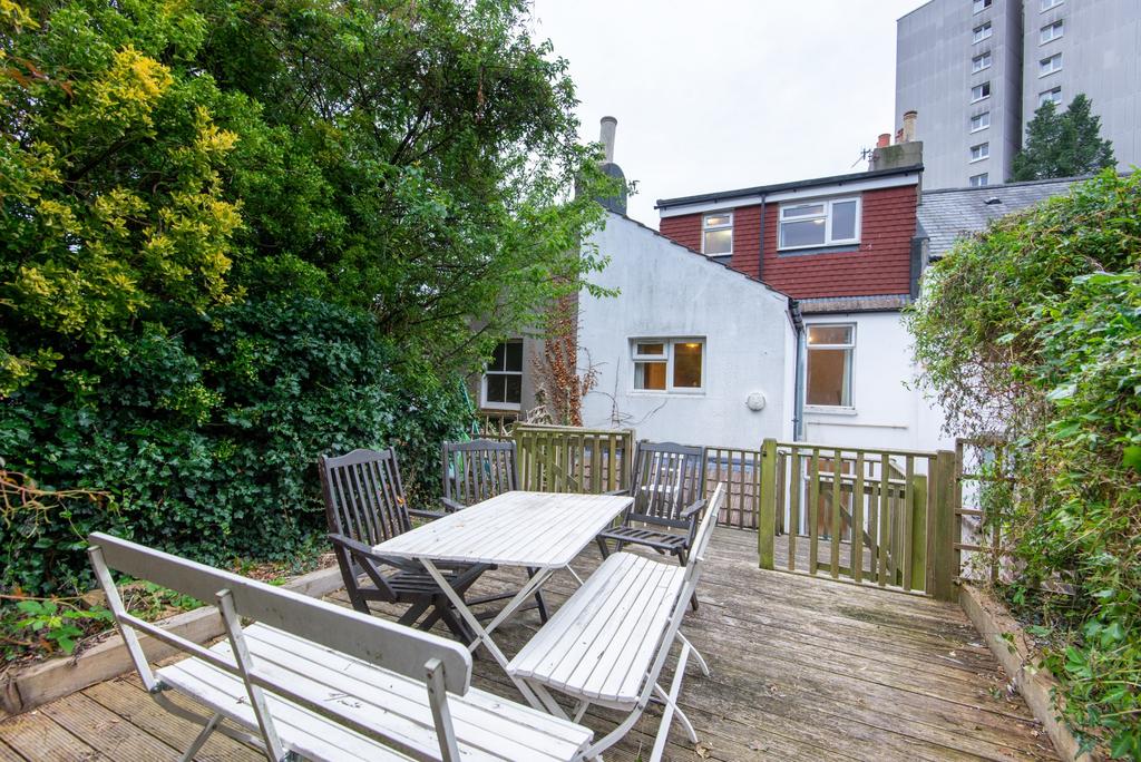 Charming exterior shot showcasing the welcoming...