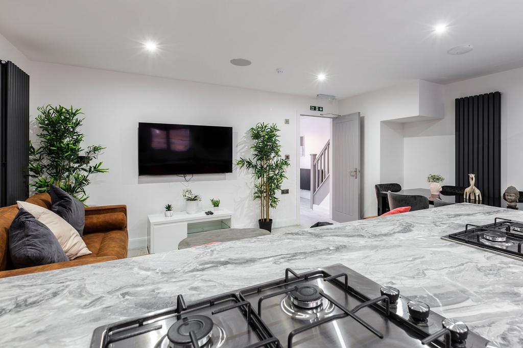 A bright and spacious living area with contempo...