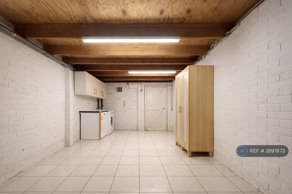 Garage Including Laundry Area And Storage