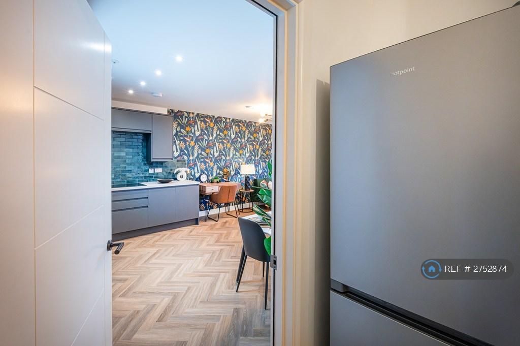 Hallway Fridge Freezer And Kitchen View