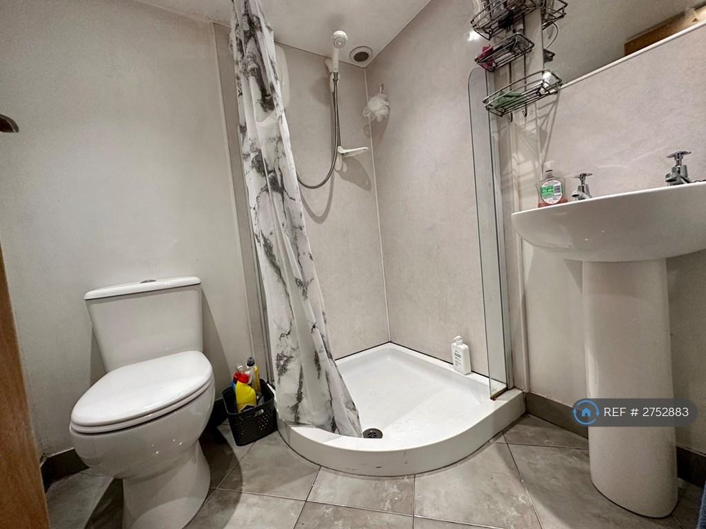 One Of The Two Bathrooms