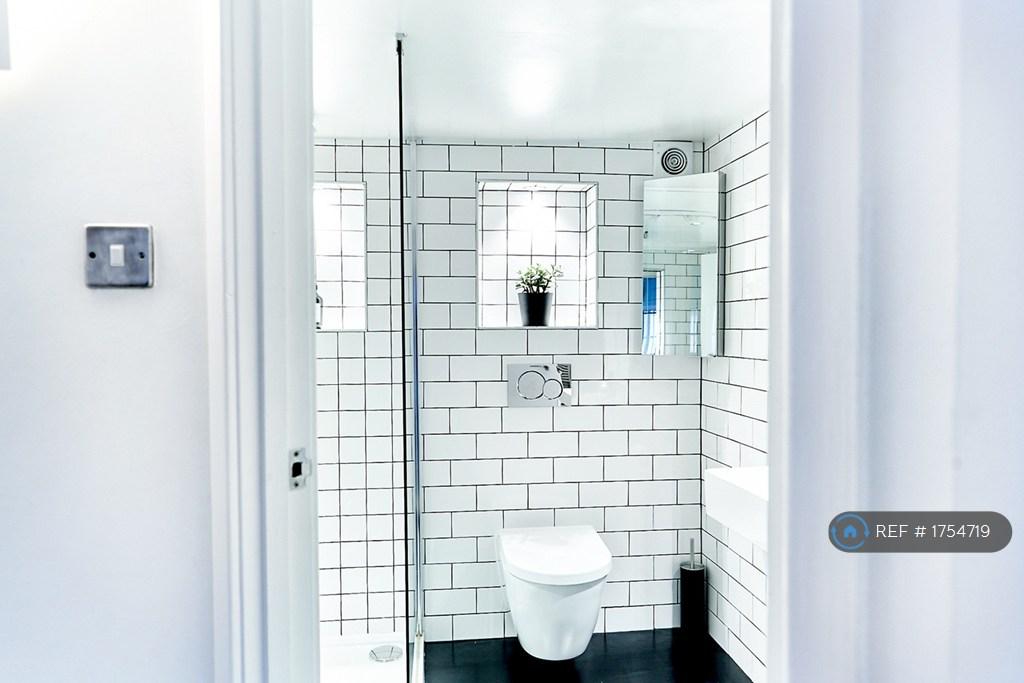 Totally Tiled Bathroom With Rubber Floor