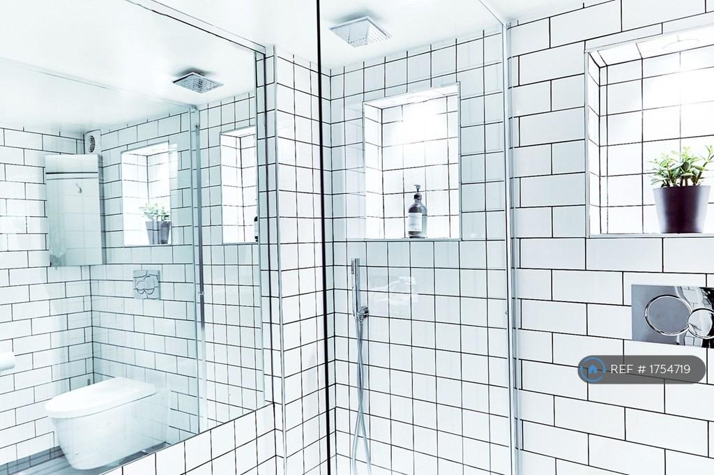 Walk-In Shower With Rainfall Head