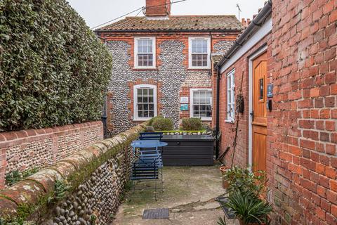undefined, A Tasteful and Attractive Cottage in Cley