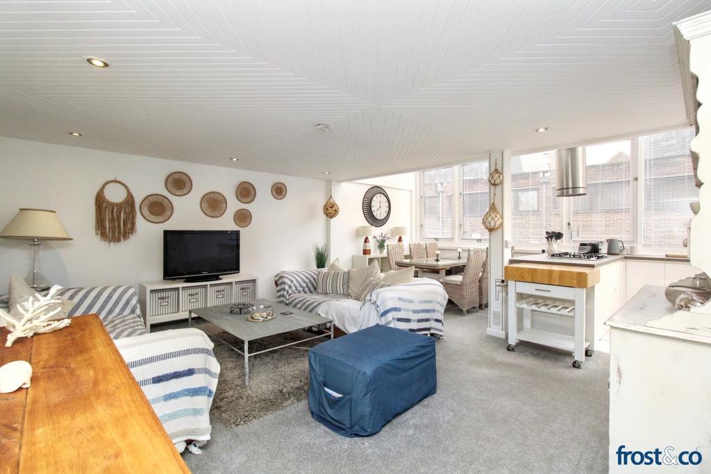 Living Room to Dining and Kitchen
