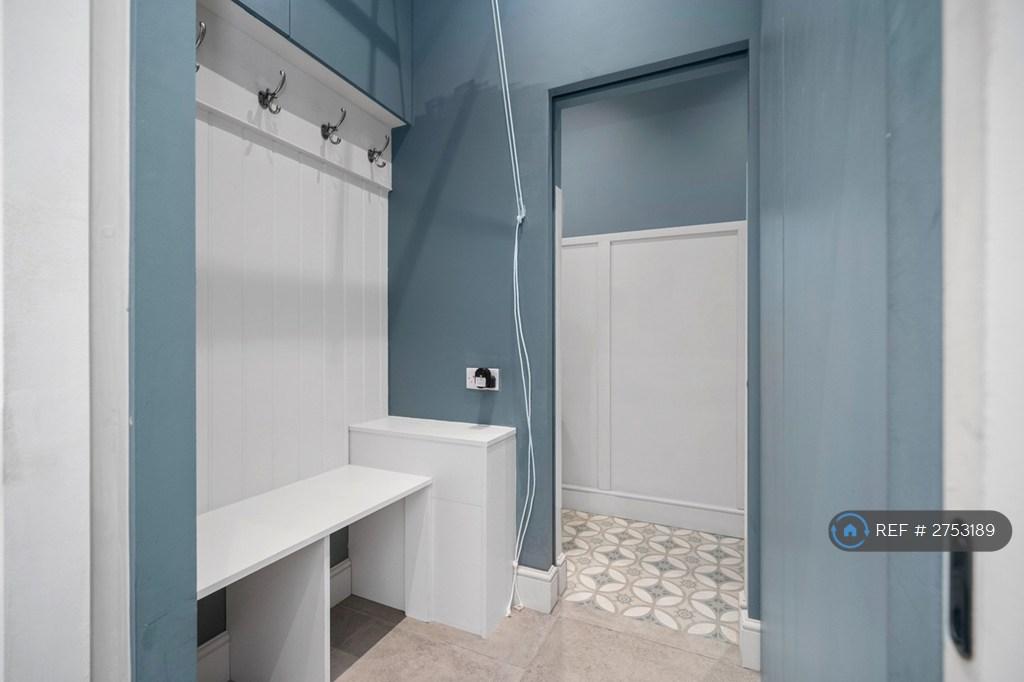 Utility And Boot Room With Wc