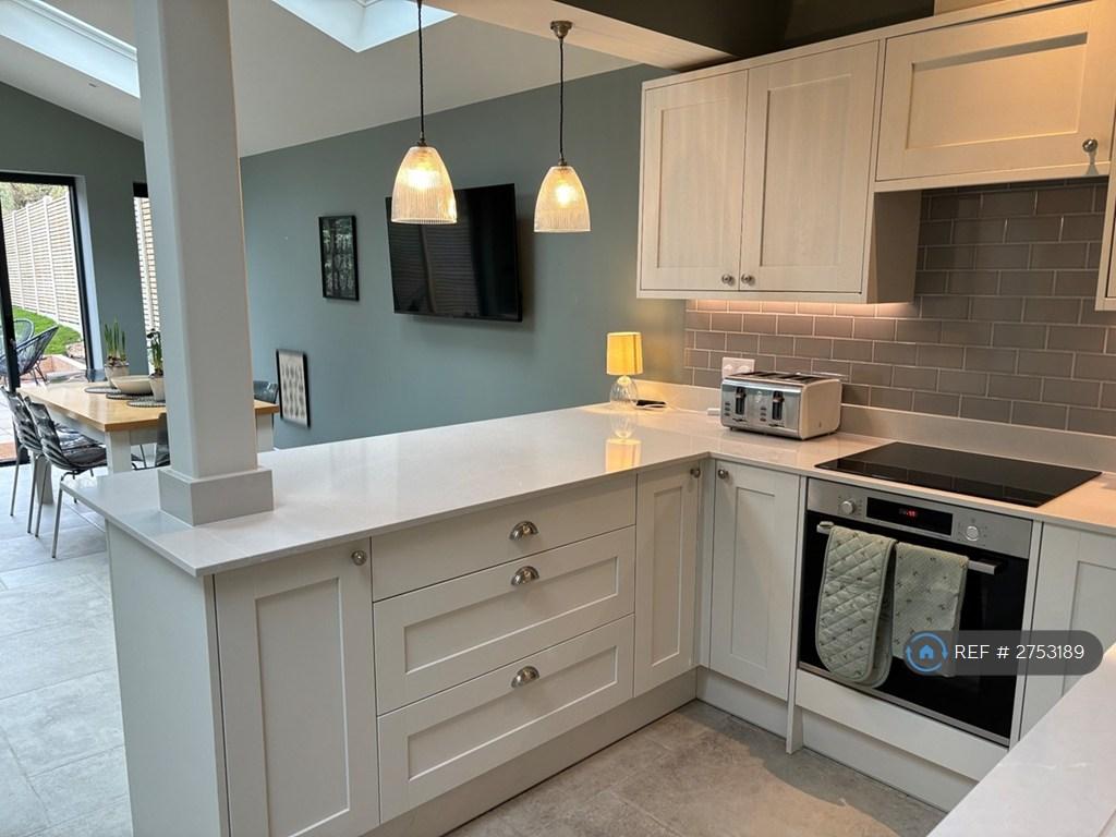 Kitchen With Oven, Microwave, Dishwasher.