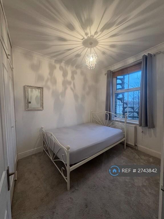 Main Bedroom With Full Wall Of Storage