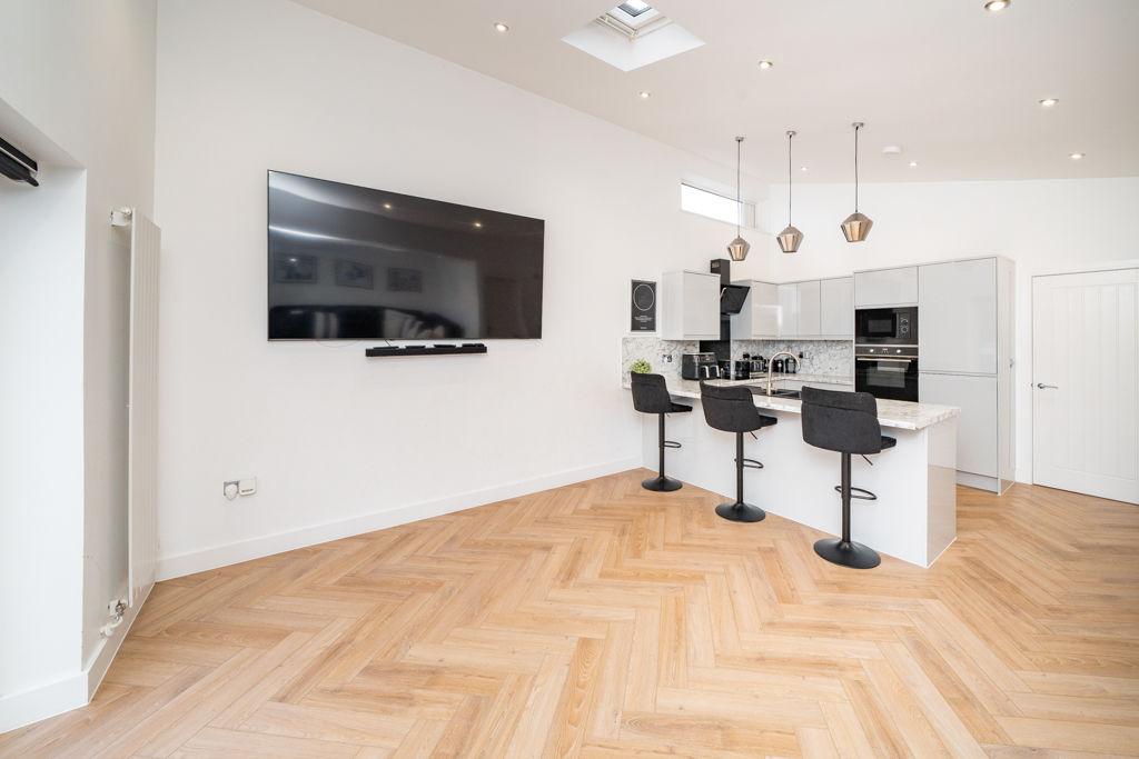Dining/kitchen/sitting room