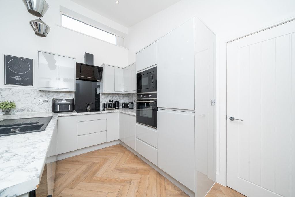 Dining/kitchen/sitting room