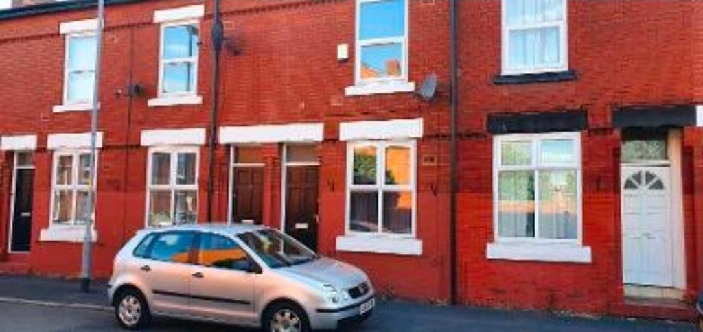 Attractive red-brick terraced street frontage w...