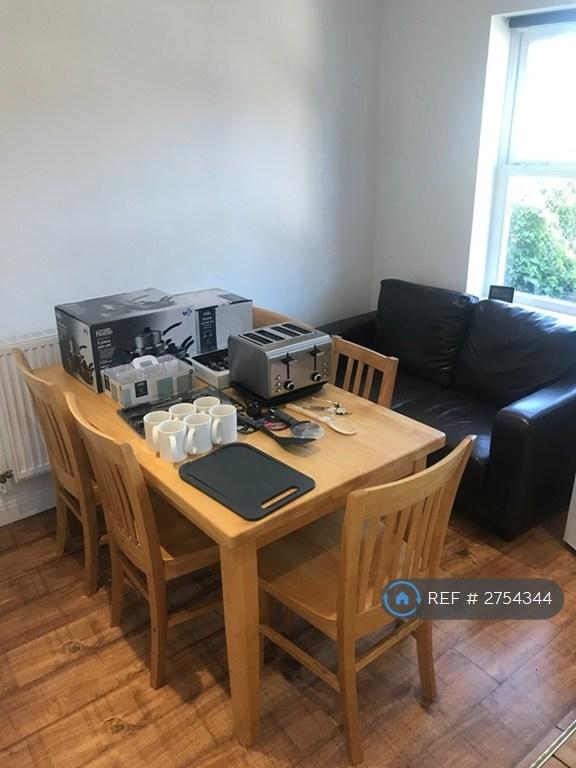 Kitchen With Cutlery/Appliances
