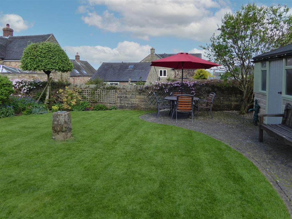 Rear Garden - lawn and outdoor dining.jpg