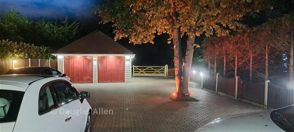 Nightime Driveway Towards Gate