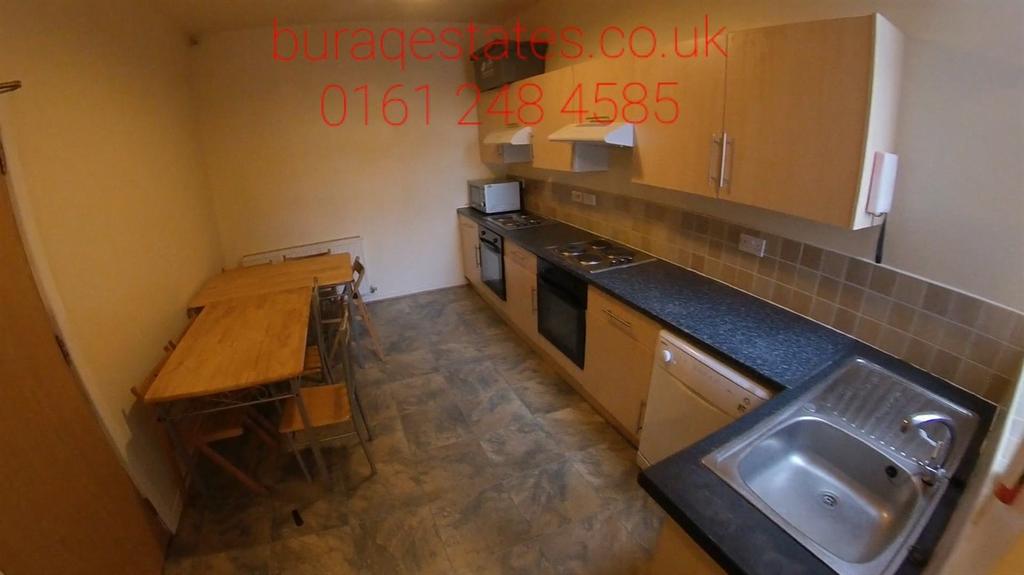 Long, practical kitchen with worktop space, int...